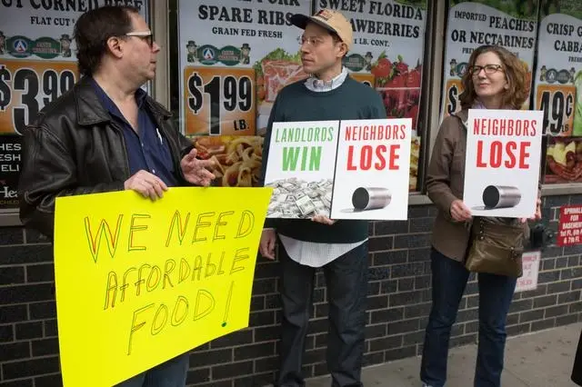 A rally last month outside the Associated Supermarket on West 14th Street, which is threatened by an extreme rent hike.